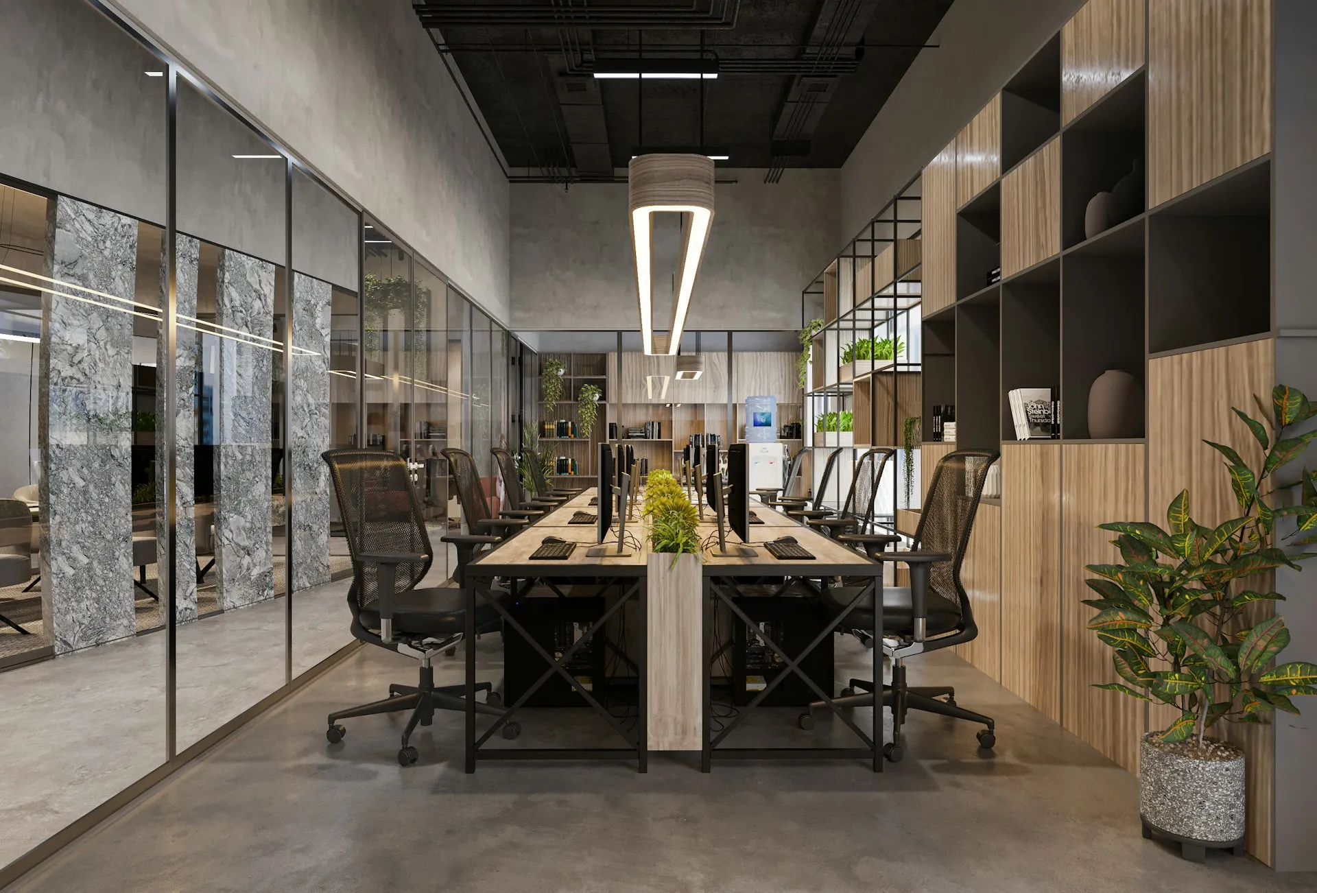 Open plan modern office Open plan modern office with long shared desk, mesh chairs, plants, and glass meeting rooms.