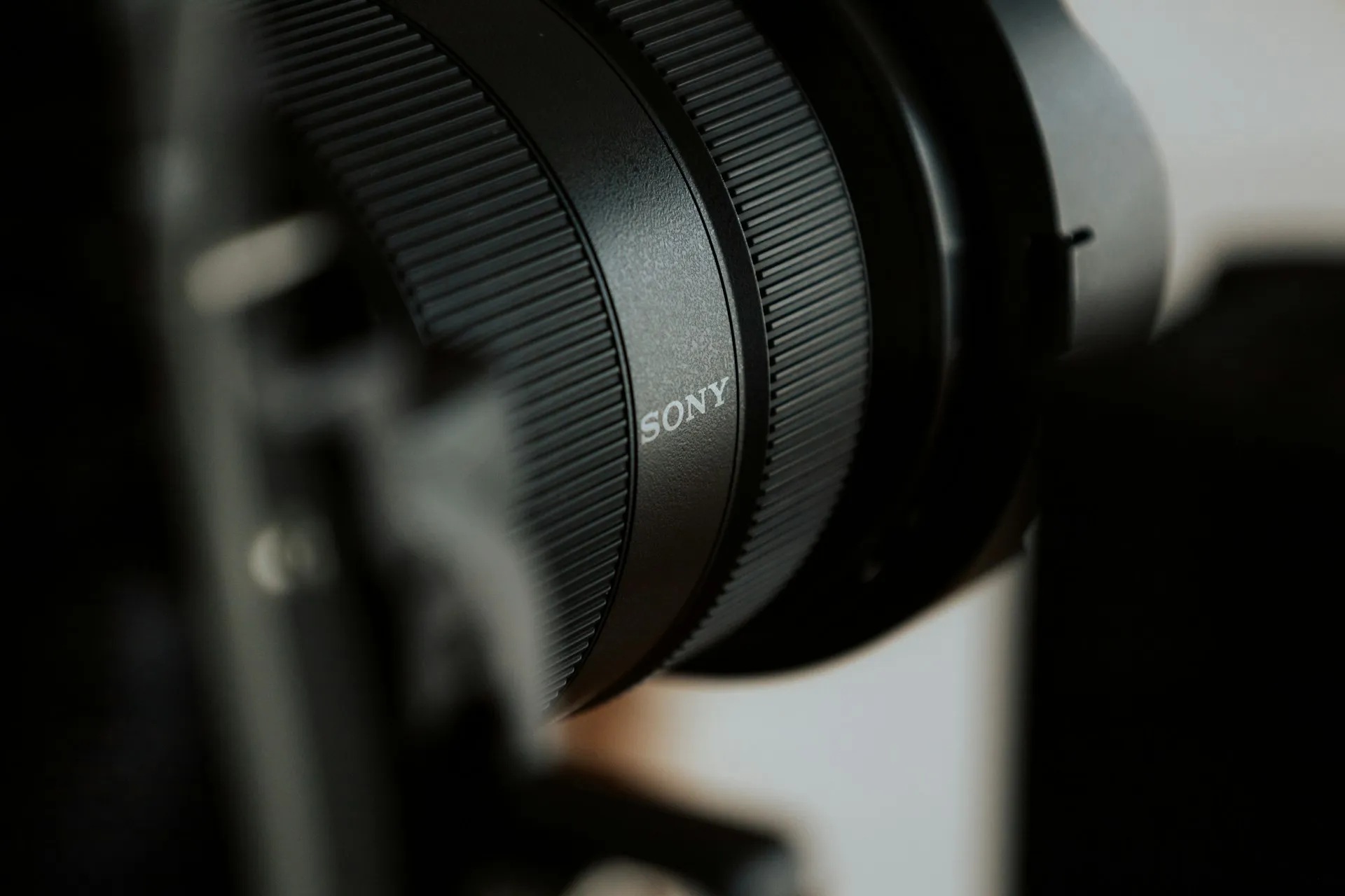 Professional camera setup Close-up of a Sony camera lens mounted on a professional camera setup.