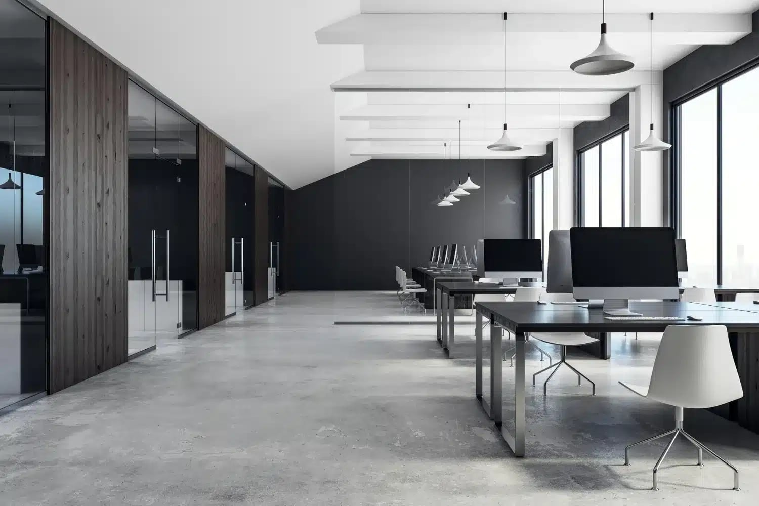 Modern office workspace Minimalist open-plan office with sleek workstations, iMacs, glass meeting rooms, and floor-to-ceiling windows letting in natural light.